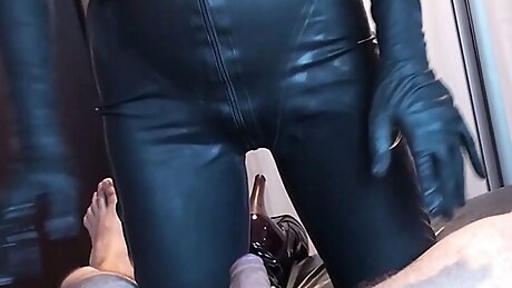 Latex Danielle play in latex mask with his toy