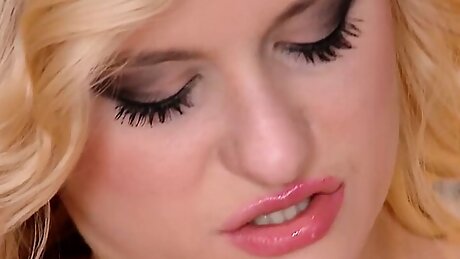 Sexy blonde Charlyse Angel strips and rubs her little clit until she has a soaking wet orgasm