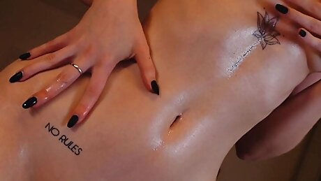 babe sucking big fantasy dildo in oil