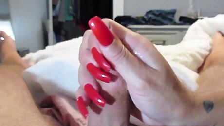 He really enjoys my long red nails!
