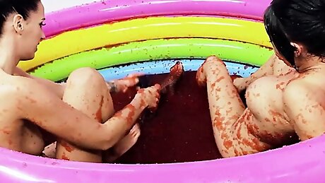 A pool of jello makes the British lesbians with big boobs want to wrestle in it