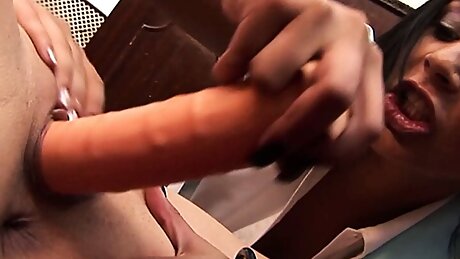 As the brunette employee snoops around she finds anal sex toys from her lesbian boss and gets caught