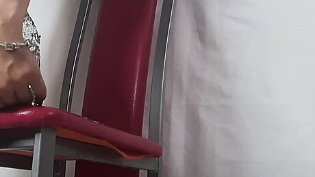 beauty in a dress and stockings rides a dildo and gets an orgasm