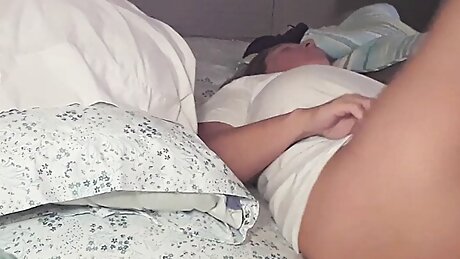 Jill getting fucked from the edge of the bed.