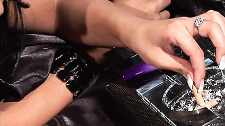 Hot brunette gets her pussy licked while smoking