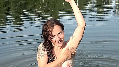 Brunette Swimming Without Panties and Bra