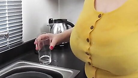 Sally gets wet doing the washing up