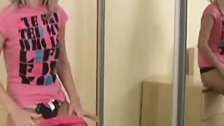 Cute Cristina strips and mastrubates solo