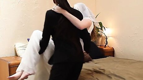 Lesbian Ela Darling fucks her bride with a strapon