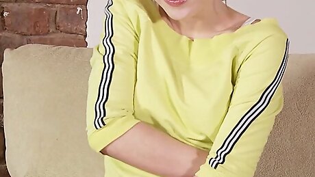 Horny petite brunette Irene plays with her hairy little pussy from behind until she orgasms