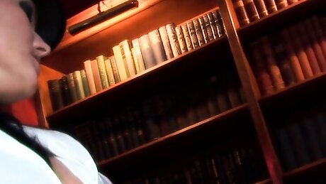 Kinky blonde shoves a stick into sexy police woman's asshole during a lesbian fuck