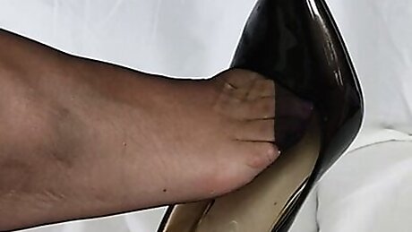 Feet In Black Stockings