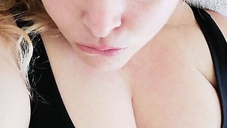 Kitty Queen teasing in her tight black top, small shorts and black socks. JOI as she plays with her big natural tits