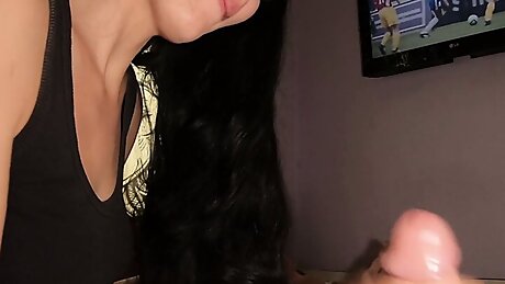 Surprise Handjob While Watching TV