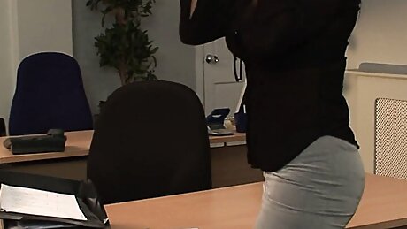 Hot secretary answers the phone while stud creams her face