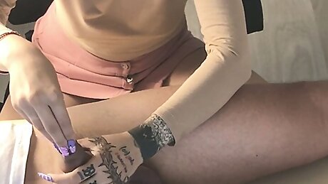 Long nails scratching cock and foreskin