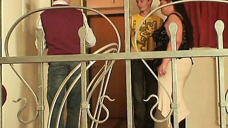 Busty mature fatty takes it from both sides