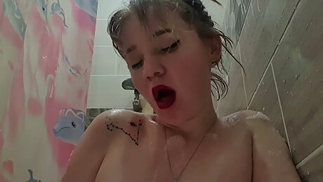 crazy girl playing with her holes in the shower - March Foxie