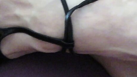 black Verscace high heels with a plaited big heel