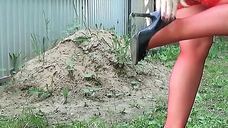 Lady in red stockings with high heels