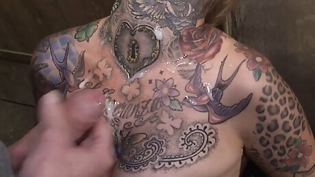 Wild tattooed cougar takes a big huge cock